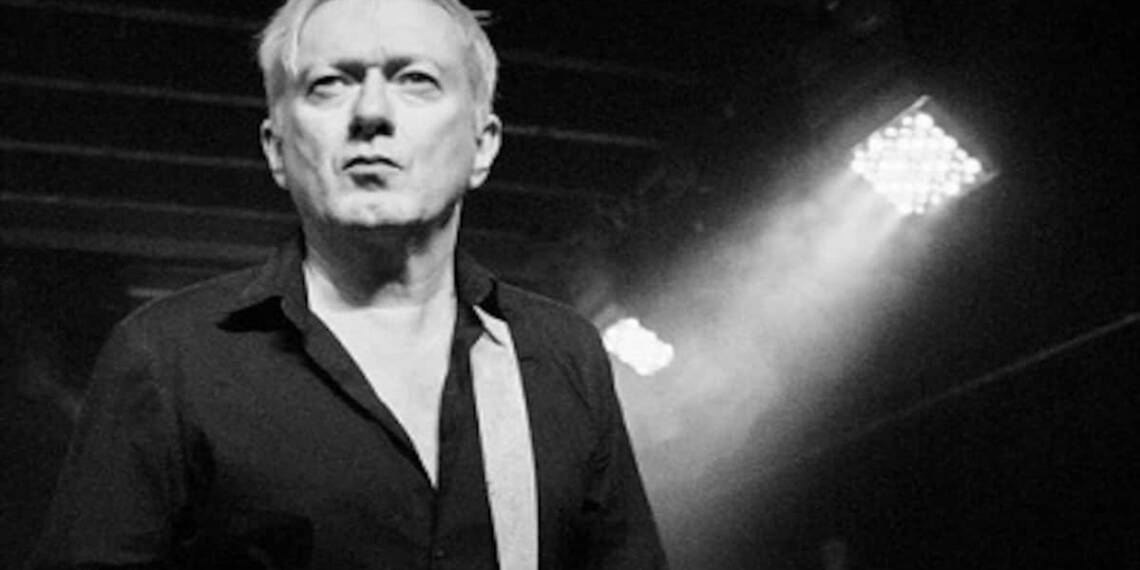 Guitarist Andy Gill playing guitar