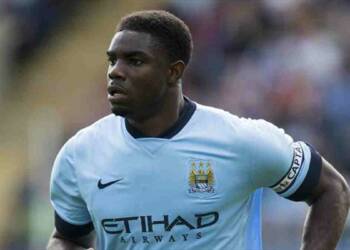 Micah Richards playing football