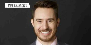 James A Janisse smiling
