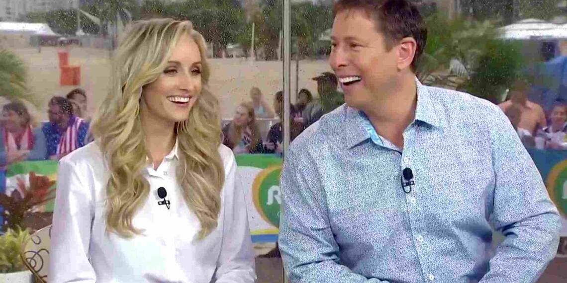 Tim Daggett with his wife in a show