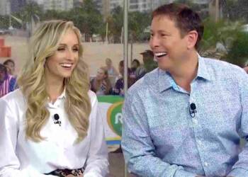 Tim Daggett with his wife in a show