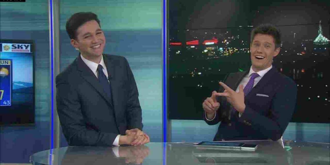 Trevor Ault anchoring a show