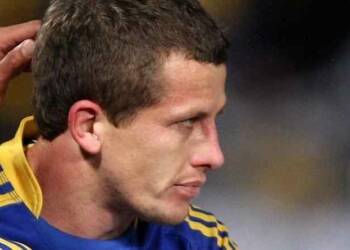 Jordan Atkins playing rugby