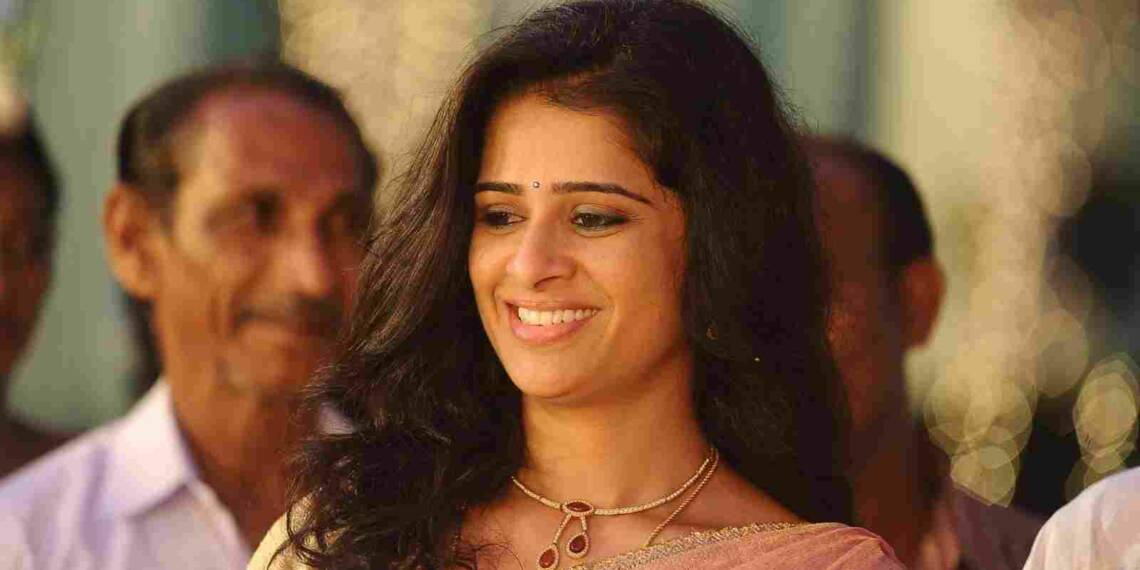 Satya Krishnan in pink saree