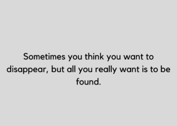 Kid Cudi quotes on grey board