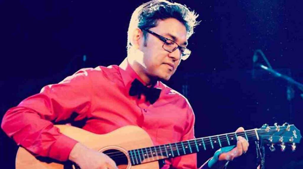 Anupam Roy playing guitar