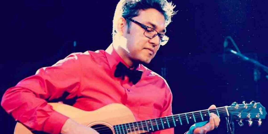 Anupam Roy playing guitar