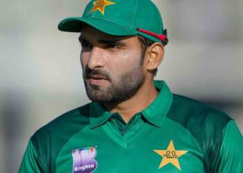 Crircketer Asif Ali playing a shot