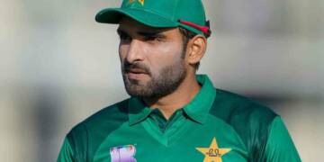 Crircketer Asif Ali playing a shot