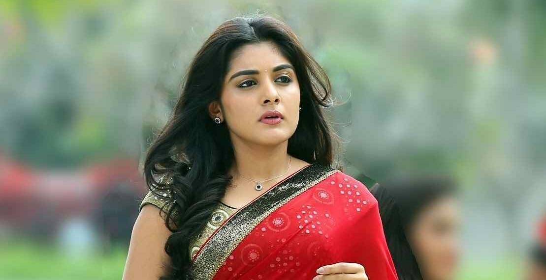 Niveda Thomas in red saree