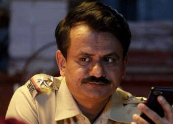 Girish Kulkarni acting as a police officer
