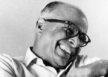 RK Narayan laughing