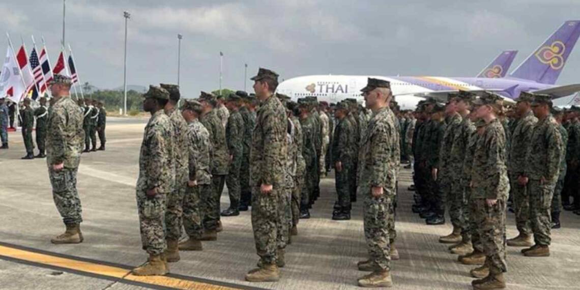 Military personnel stand during Cobra Gold's opening ceremony Feb. 27 at U-Tapao Royal Thai Navy Airfield in Thailand Rayong province. (Photo by Kosuke Inoue)