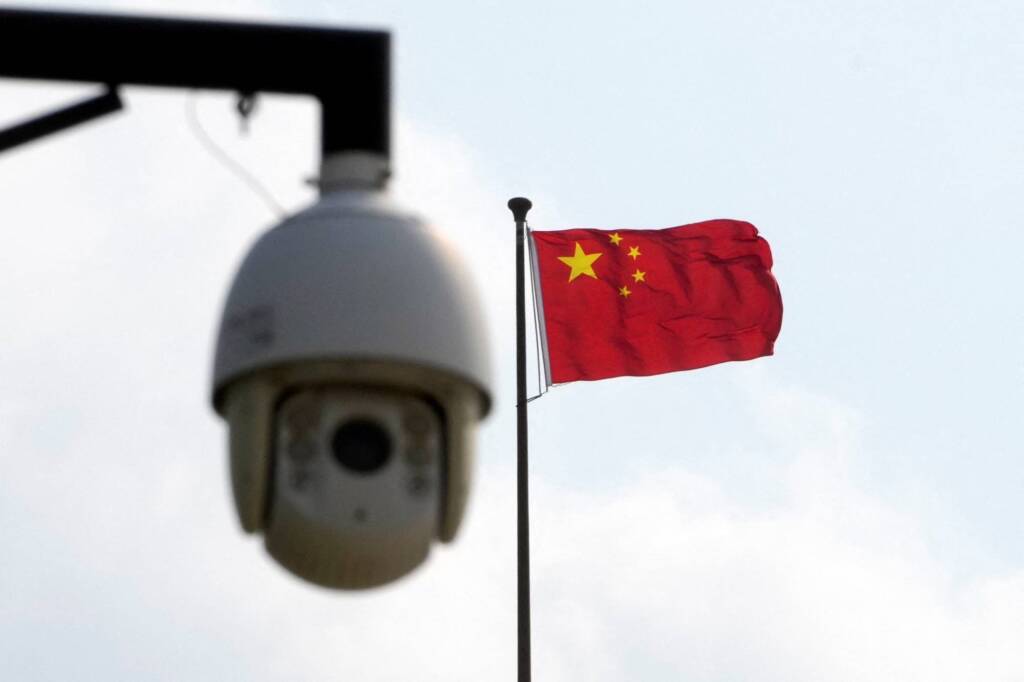 A security surveillance camera overlooks a street in Beijing. Chinese authorities' effort to root out spies has fueled concerns among foreign companies.