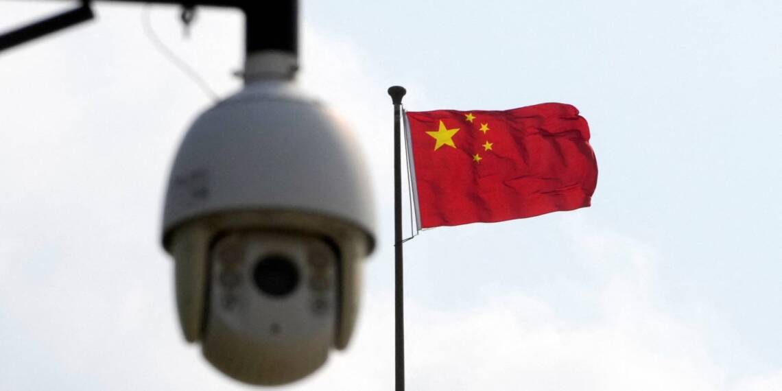A security surveillance camera overlooks a street in Beijing. Chinese authorities' effort to root out spies has fueled concerns among foreign companies.