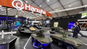 South Korea's biggest weapons maker, Hanwha Aerospace, displays model military vehicles at its booth at the 2023 Seoul International Aerospace and Defense Exhibition in Seongnam, South Korea, on Oct. 16, 2023.   © Reuters
