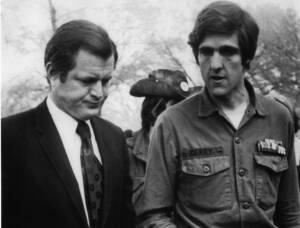 John Kerry, who served in Vietnam, walks with Sen.