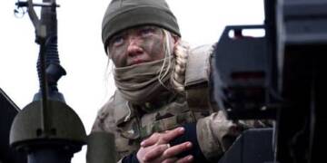 A female soldier looks on during a US-led military exercise last year in Oksbol, Denmark. © Sergei Gapon/Anadolu Agency via Getty Images