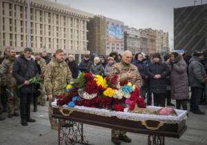 Ukrainians honor dead fighter at outdoor funeral in capital