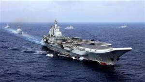 China's aircraft carrier Liaoning takes part in a drill in the western Pacific Ocean in 2018.   © Reuters