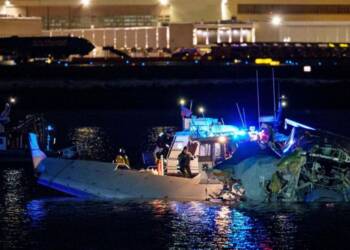 Tragic mid air collision between US plane and military helicopter leaves many dead