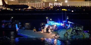 Tragic mid air collision between US plane and military helicopter leaves many dead