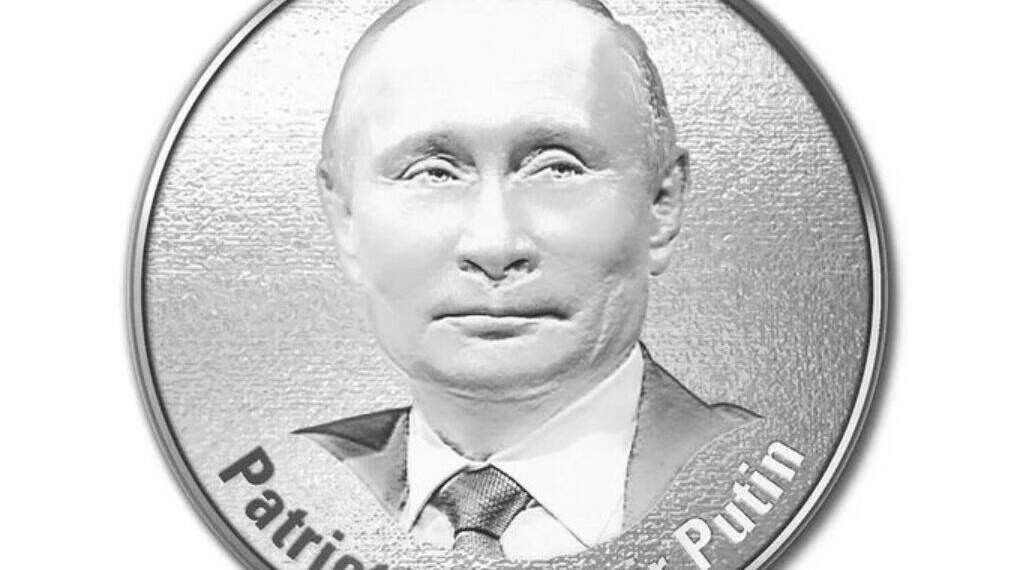 A silver coin featuring Putin’s portrait
