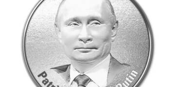 A silver coin featuring Putin’s portrait