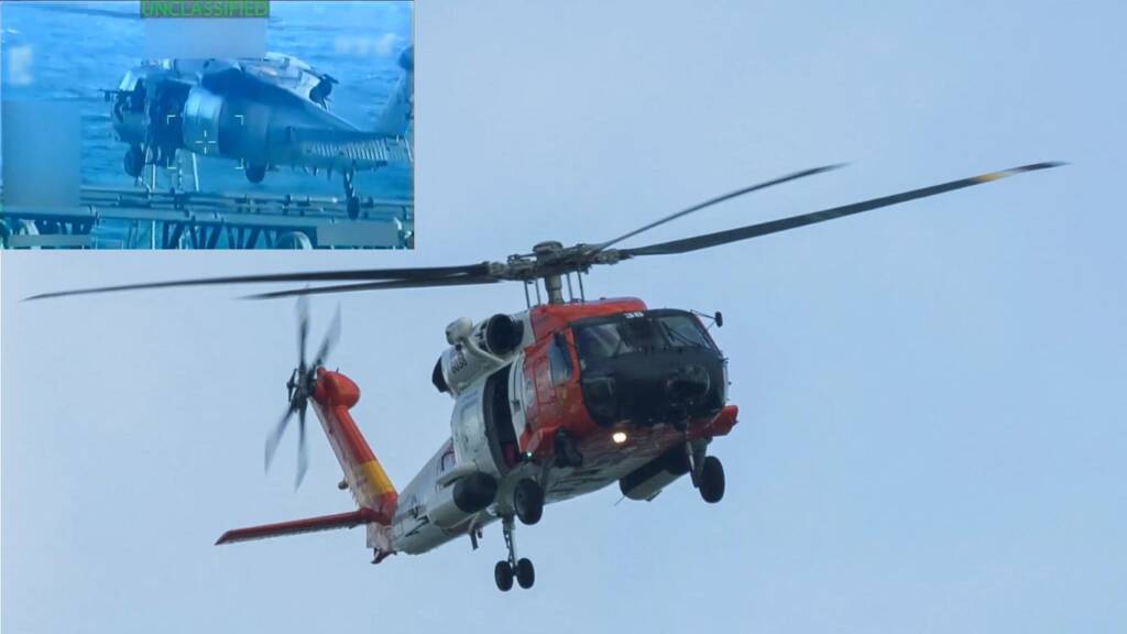 A U.S. Coast Guard helicopter flying.