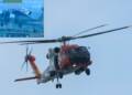 A U.S. Coast Guard helicopter flying.