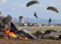 RAF Hawk T2 training jet crashes and burns near RAF Valley on Anglesey as two pilots parachute to safety.”