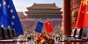 EU-China trade talks represented by European Union and Chinese flags at a diplomatic meeting in Beijing.