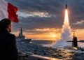 France nuclear missile test showing a French ballistic missile launching from a submarine into the Atlantic Ocean during a naval exercise.